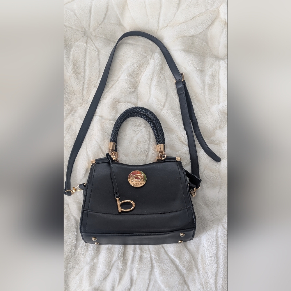 Elegant Black Handbag with Gold Accents